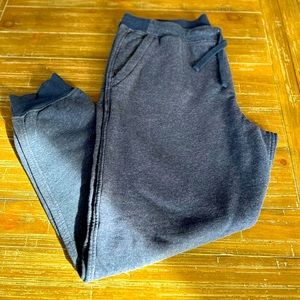 Men’s Patagonia navy cotton pants with zipper pockets